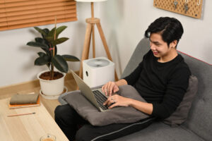 Man in black tshirt working in a remote setup
